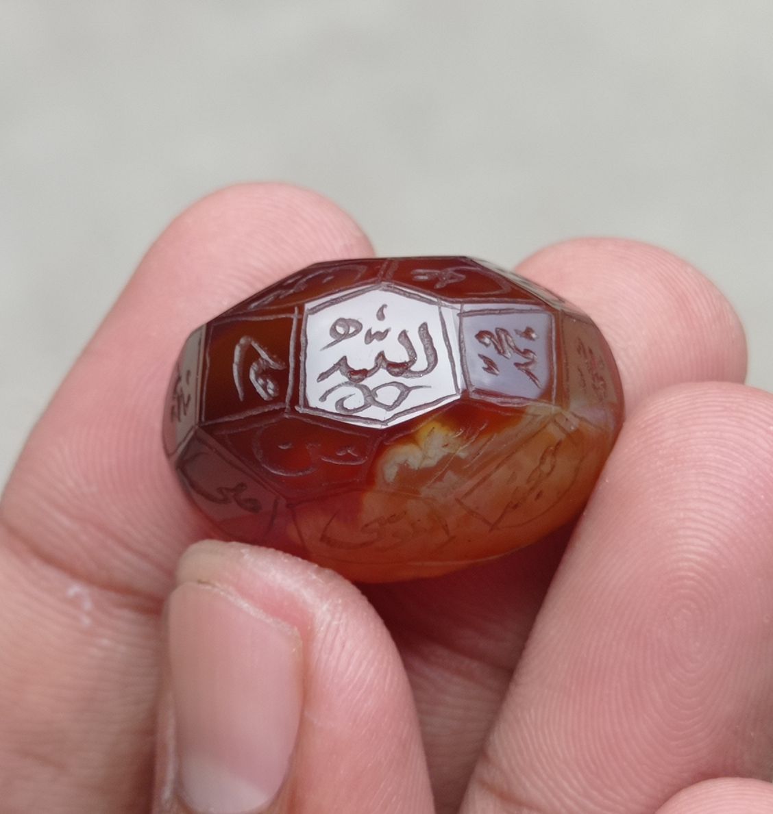 59.85ct Carnelian Carving - Engraved Aqeeq - 12 Imam Name - 29x21mm 59.85ct Carnelian Carving - Engraved Aqeeq - 12 Imam Name - 29x21mm