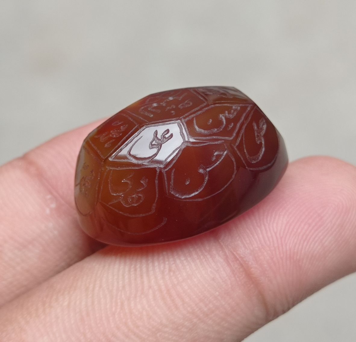 59.85ct Carnelian Carving - Engraved Aqeeq - 12 Imam Name - 29x21mm 59.85ct Carnelian Carving - Engraved Aqeeq - 12 Imam Name - 29x21mm