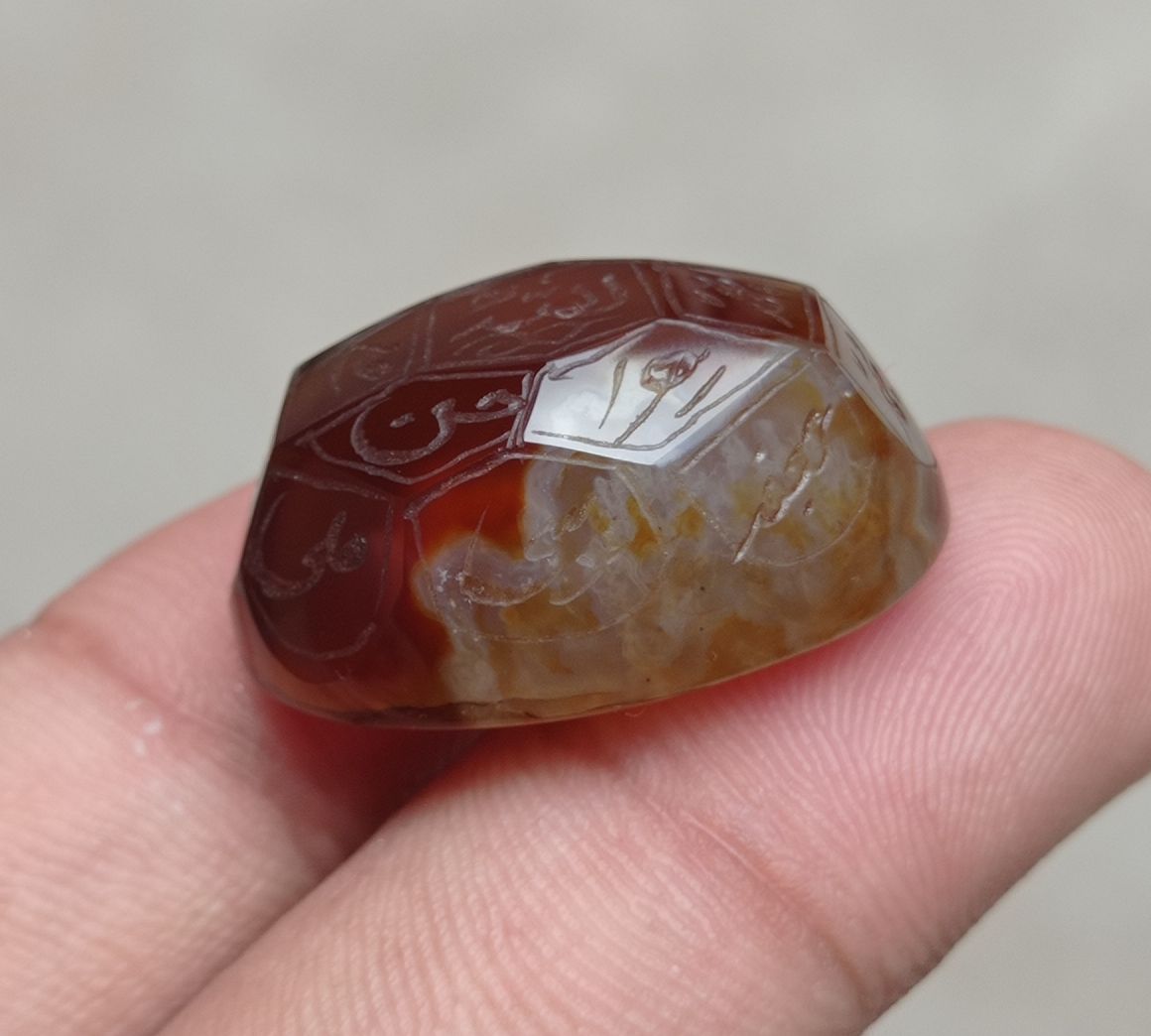 59.85ct Carnelian Carving - Engraved Aqeeq - 12 Imam Name - 29x21mm 59.85ct Carnelian Carving - Engraved Aqeeq - 12 Imam Name - 29x21mm