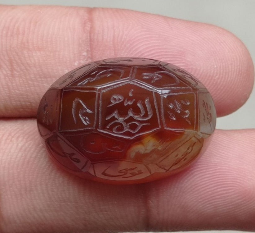 59.85ct Carnelian Carving - Engraved Aqeeq - 12 Imam Name - 29x21mm 59.85ct Carnelian Carving - Engraved Aqeeq - 12 Imam Name - 29x21mm