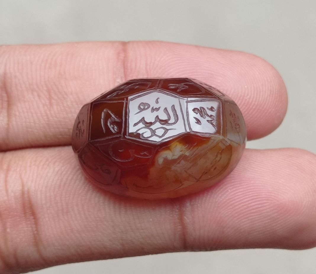 59.85ct Carnelian Carving - Engraved Aqeeq - 12 Imam Name - 29x21mm 59.85ct Carnelian Carving - Engraved Aqeeq - 12 Imam Name - 29x21mm