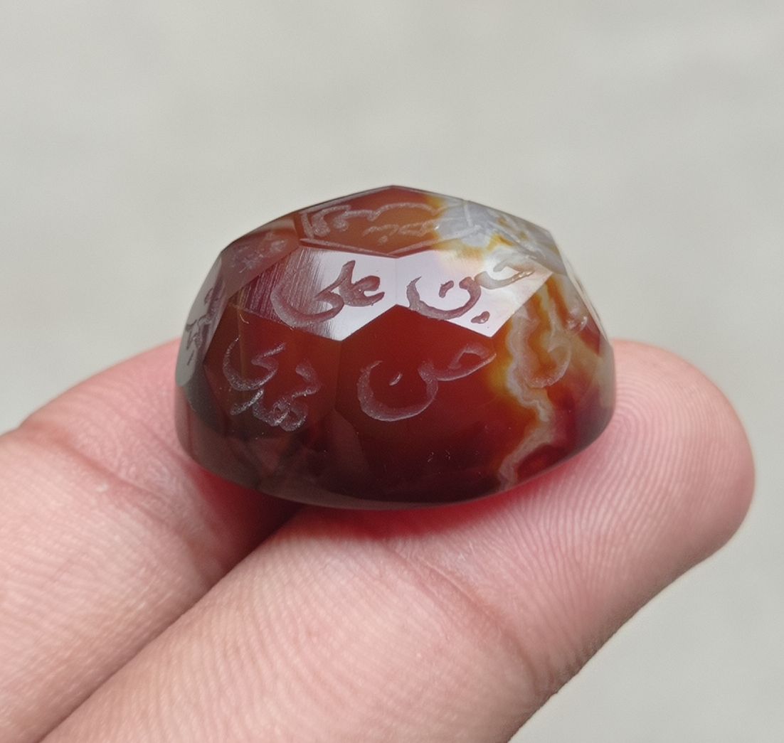 59.1ct Carnelian Carving - Engraved Aqeeq - 12 Imam Name - 27x21mm 59.1ct Carnelian Carving - Engraved Aqeeq - 12 Imam Name - 27x21mm
