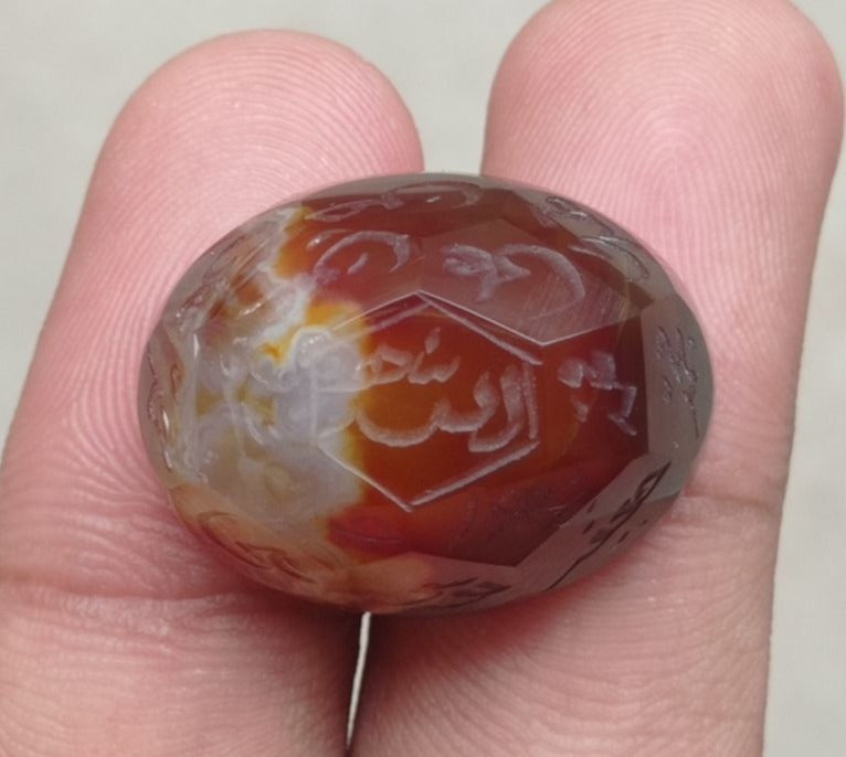 59.1ct Carnelian Carving - Engraved Aqeeq - 12 Imam Name - 27x21mm 59.1ct Carnelian Carving - Engraved Aqeeq - 12 Imam Name - 27x21mm