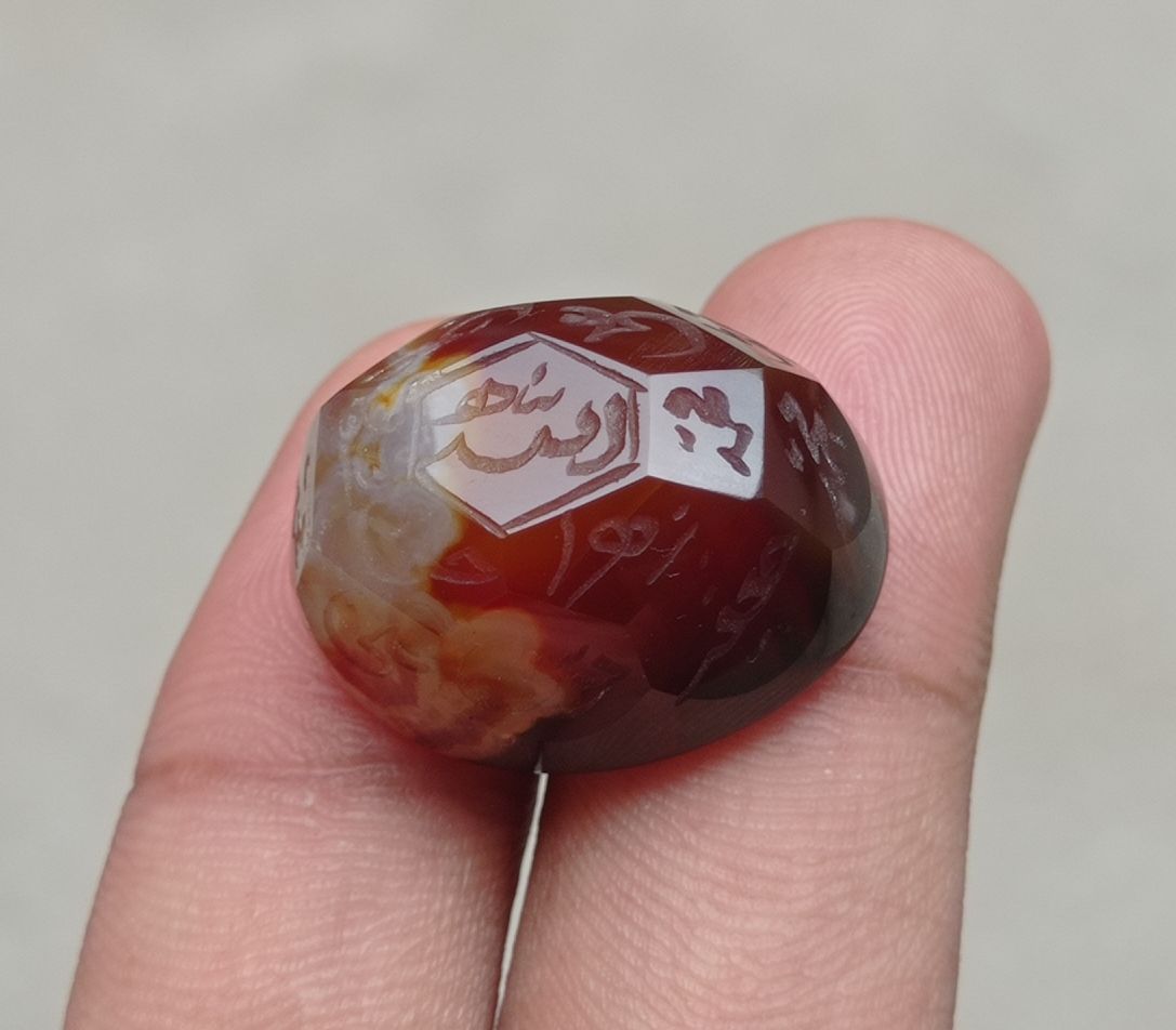 59.1ct Carnelian Carving - Engraved Aqeeq - 12 Imam Name - 27x21mm 59.1ct Carnelian Carving - Engraved Aqeeq - 12 Imam Name - 27x21mm