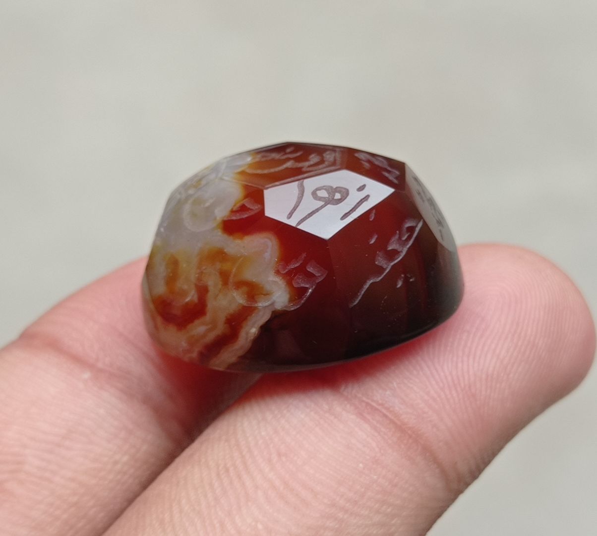 59.1ct Carnelian Carving - Engraved Aqeeq - 12 Imam Name - 27x21mm 59.1ct Carnelian Carving - Engraved Aqeeq - 12 Imam Name - 27x21mm