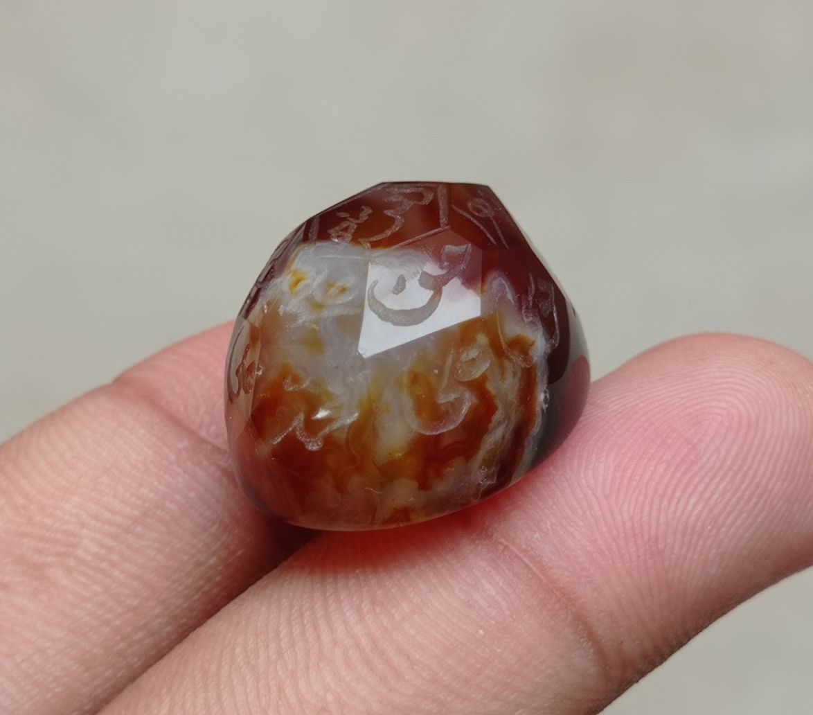 59.1ct Carnelian Carving - Engraved Aqeeq - 12 Imam Name - 27x21mm 59.1ct Carnelian Carving - Engraved Aqeeq - 12 Imam Name - 27x21mm