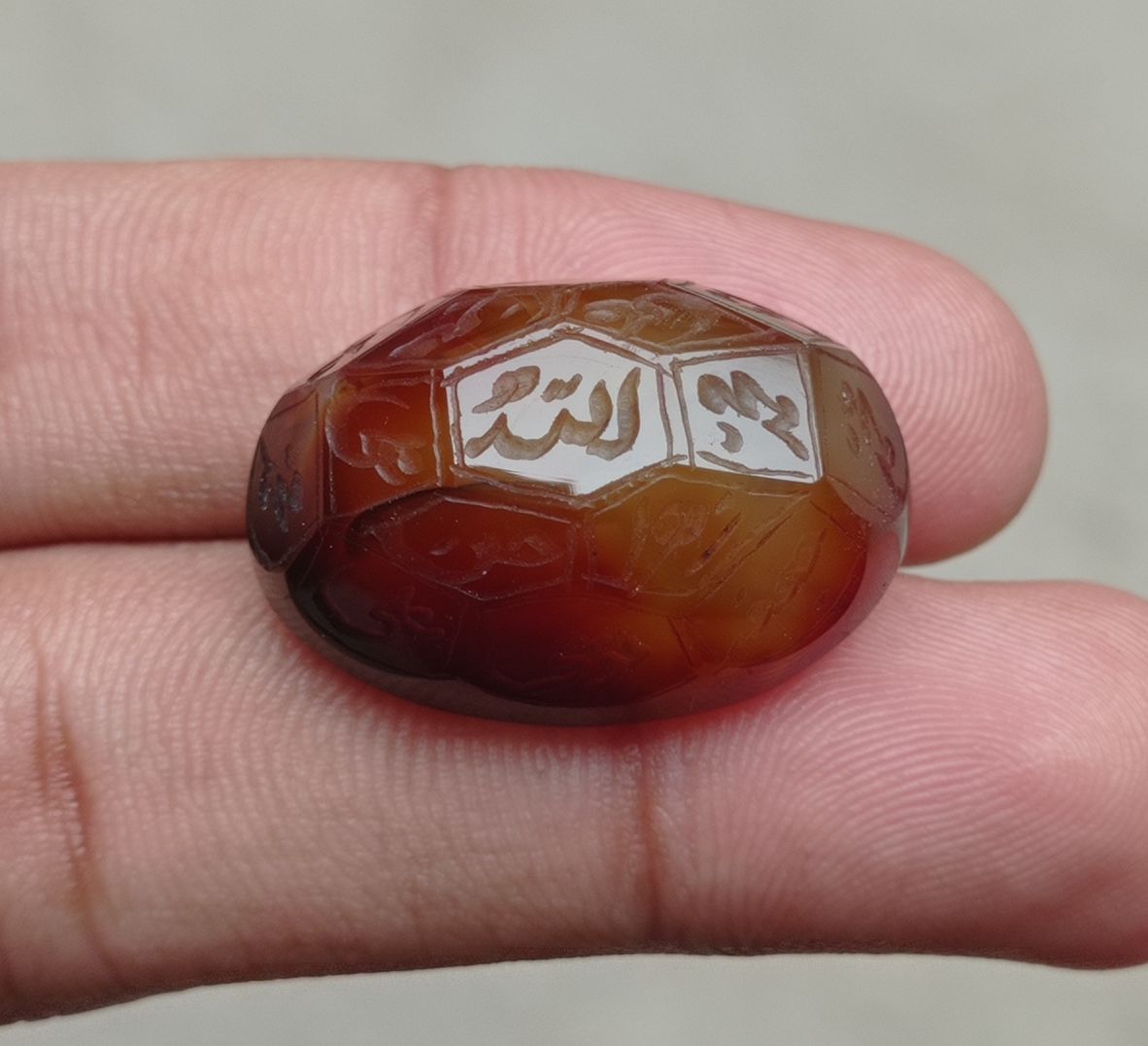 52.1ct Carnelian Carving - Engraved Aqeeq - 12 Imam Name - 29x19mm 52.1ct Carnelian Carving - Engraved Aqeeq - 12 Imam Name - 29x19mm