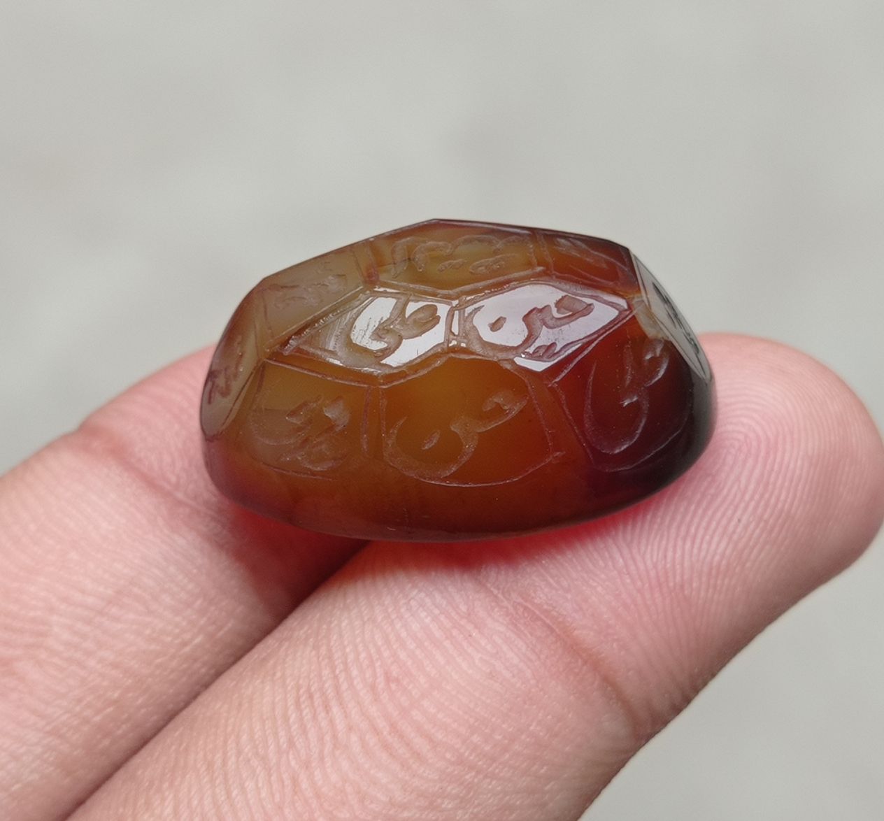 52.1ct Carnelian Carving - Engraved Aqeeq - 12 Imam Name - 29x19mm 52.1ct Carnelian Carving - Engraved Aqeeq - 12 Imam Name - 29x19mm