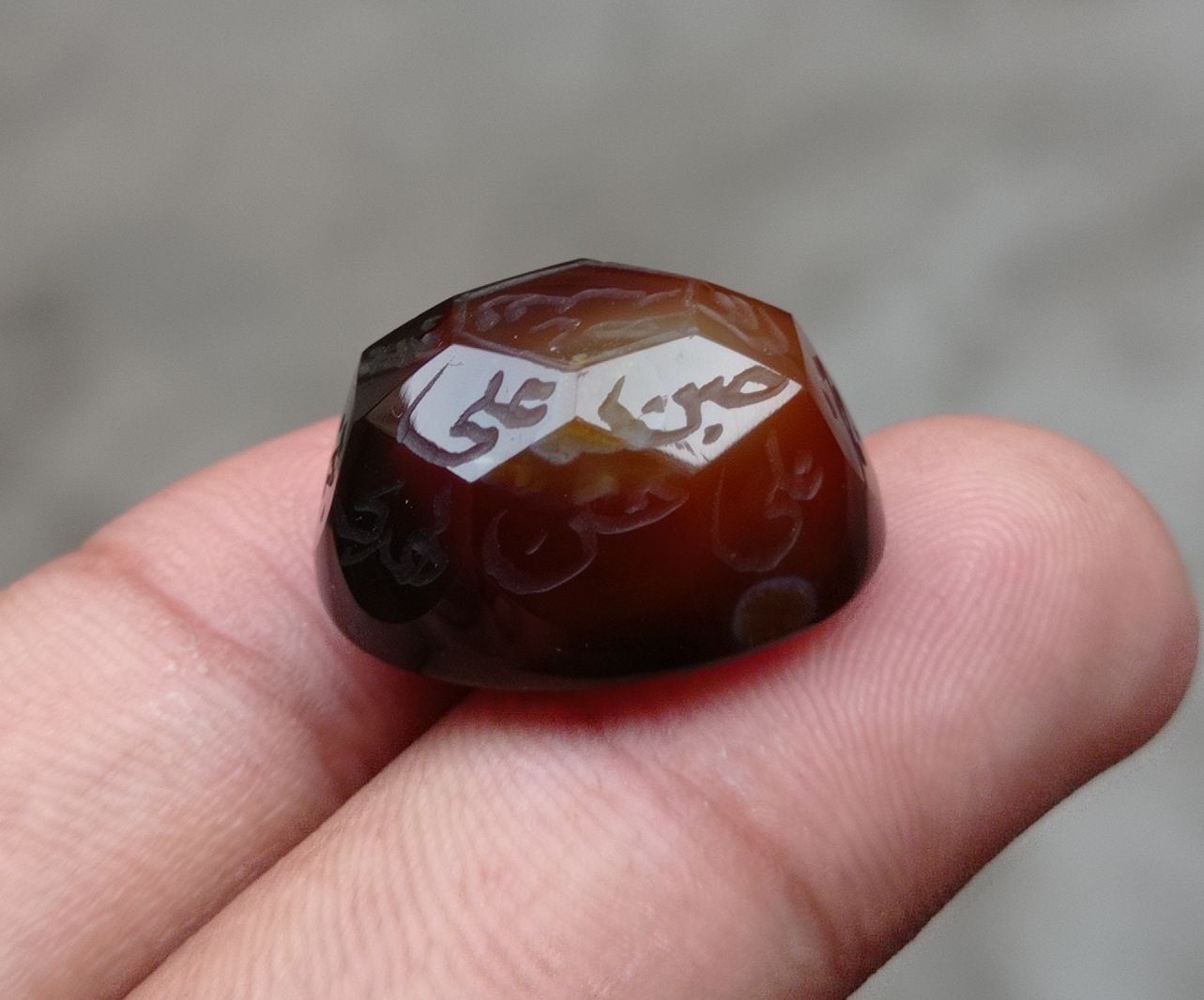 34.5ct Carnelian Carving - Engraved Aqeeq - 12 Imam Name - 22x17mm 34.5ct Carnelian Carving - Engraved Aqeeq - 12 Imam Name - 22x17mm