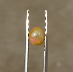 1.35 قيراط أوبال للبيع - أوبال ناري أبيض - أوبال ويلو - أوبال عسل - حجر بخت شهر أكتوبر - 8 × 7 ملم