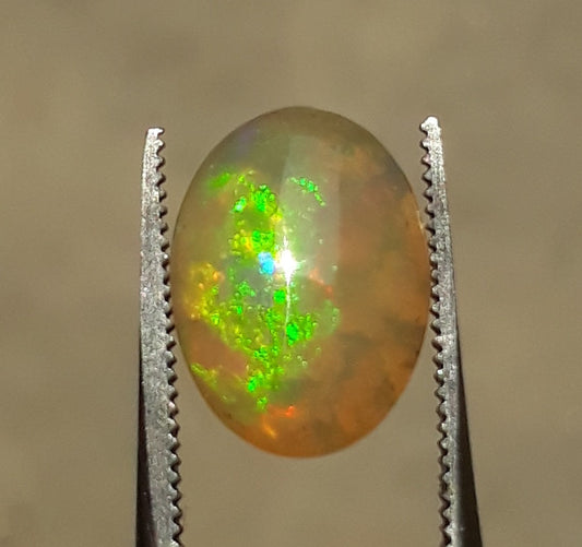 Opal for Sale - White Fire Opal - Welo Opal - October Birthstone - 13.5x10mm 3.3ct