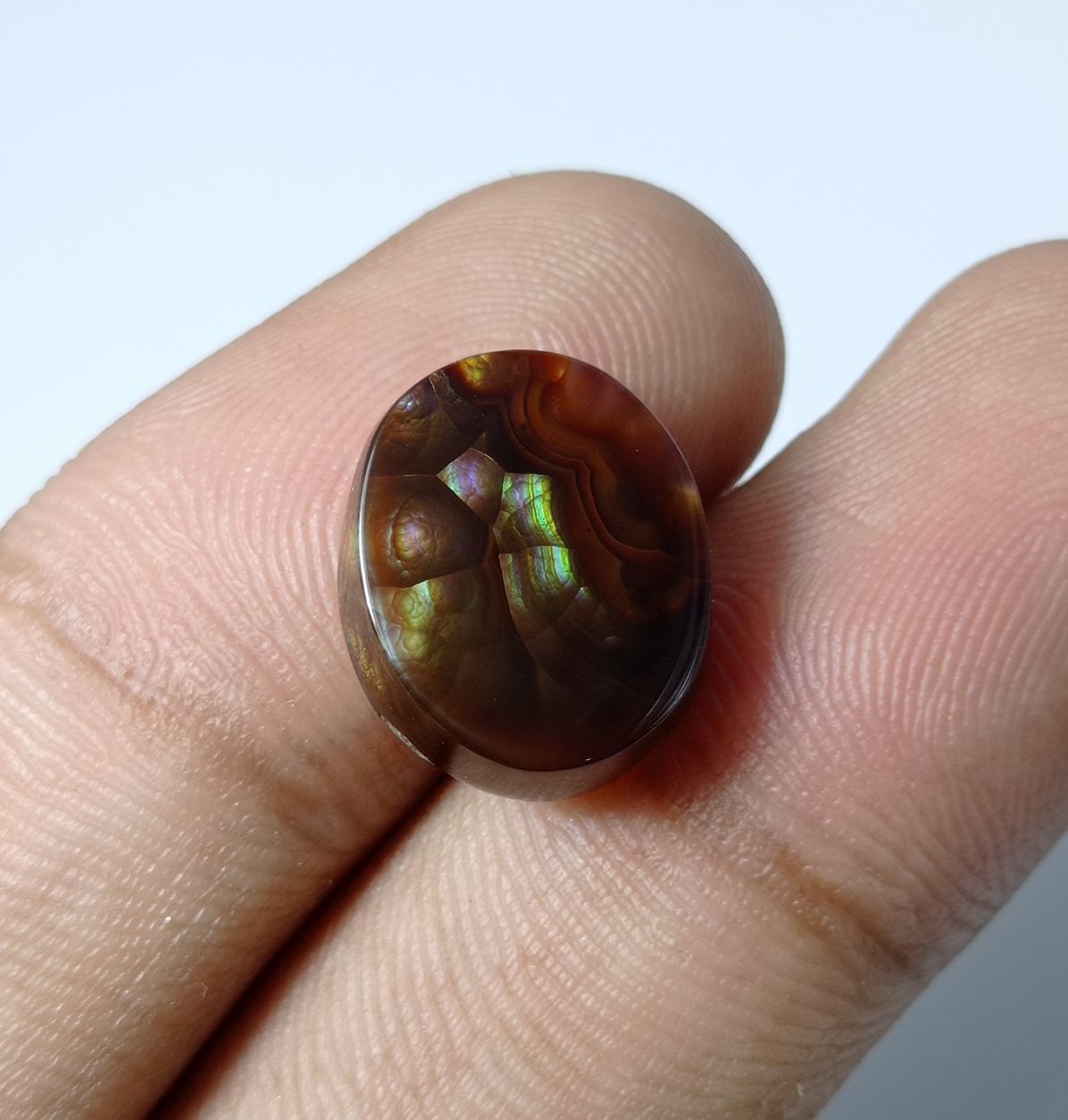 8.4ct Mexican Oval Shape Fire Agate - Purple & Green Fire- Dimensions 15x12x5mm